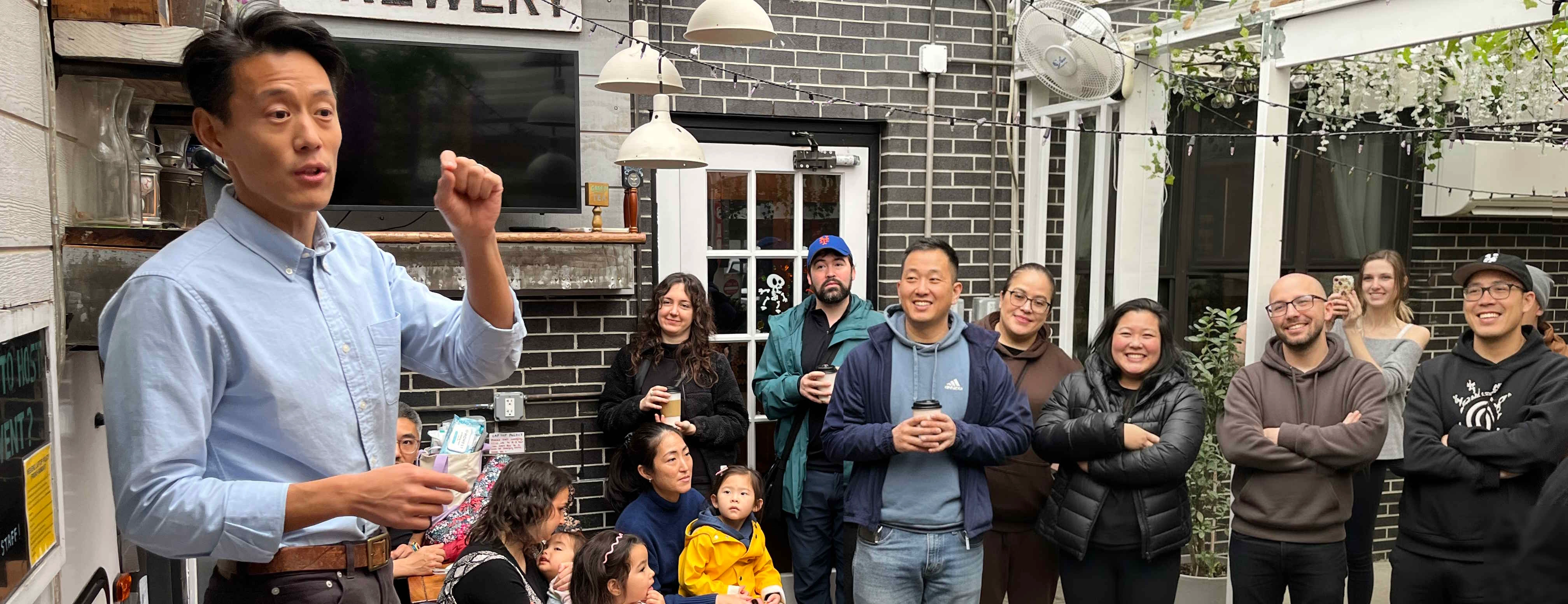 Two people volunteering and smiling